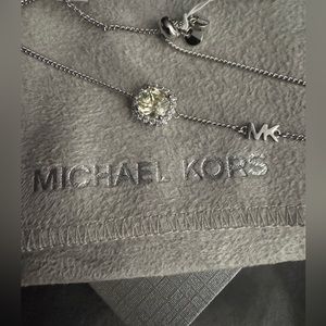Micheal kors bracelet. New with pouch and tags.
